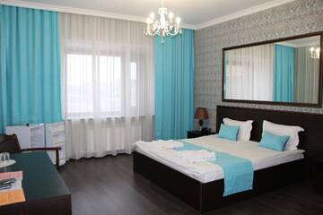 Фото номера Большой двухместный номер с 1 кроватью Отель Hotel Bukpa г. Караганда 2
