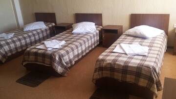 Фото номера Бюджетный трехместный номер Отель Corona Hotel г. Караганда 7