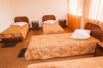 Фото номера Стандартный четырехместный номер Отель Corona Hotel г. Караганда 4