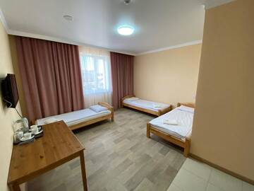 Фото номера Стандартный трехместный номер Отель Astika Hotel г. Караганда 5