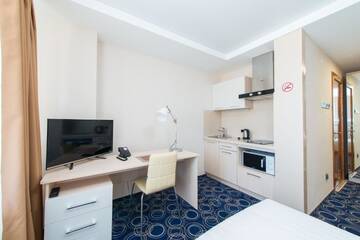 Фото номера Стандартный номер-студио Апарт-отели Apart Hotel 92/2 г. Караганда 8