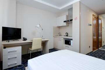 Фото номера Стандартный номер-студио Апарт-отели Apart Hotel 92/2 г. Караганда 9