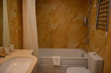 Фото номера Стандартный номер-студио Апарт-отели Apart Hotel 92/2 г. Караганда 10