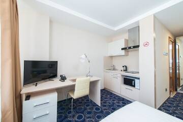 Фото номера Стандартный номер-студио Апарт-отели Apart Hotel 92/2 г. Караганда 4