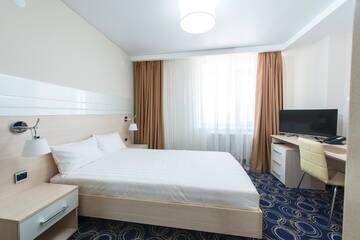 Фото номера Стандартный номер-студио Апарт-отели Apart Hotel 92/2 г. Караганда 5