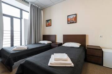 Фото номера Двухместный номер с 2 отдельными кроватями Отель LaCasa Hotel г. Караганда 4