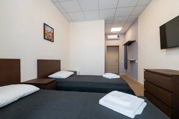 Фото номера Двухместный номер с 2 отдельными кроватями Отель LaCasa Hotel г. Караганда 3