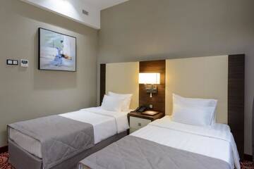 Фото номера Стандартный двухместный номер с 2 отдельными кроватями Отель Hotel Senator г. Караганда 3