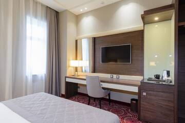 Фото номера Одноместный номер Делюкс Отель Hotel Senator г. Караганда 2